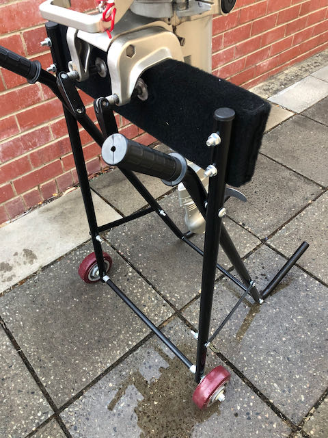 Outboard motor engine trolley with 5hp 4 stroke engine secured