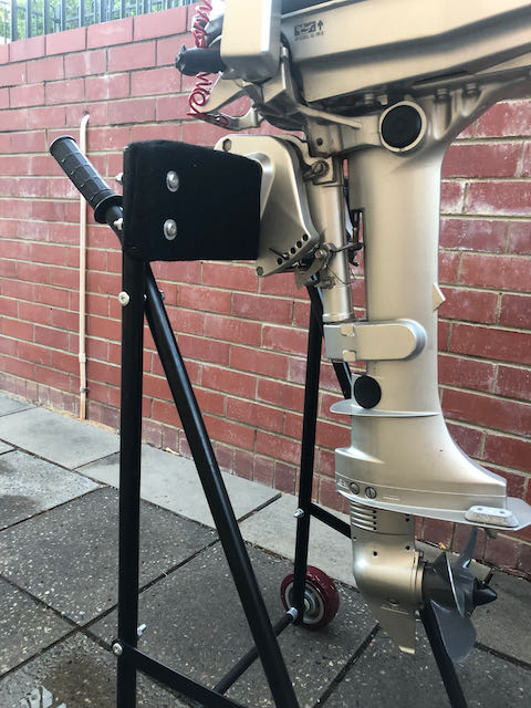 Outboard motor engine trolley with 5hp 4 stroke engine secured