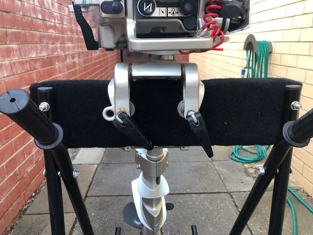 Outboard motor engine trolley with 5hp 4 stroke engine secured
