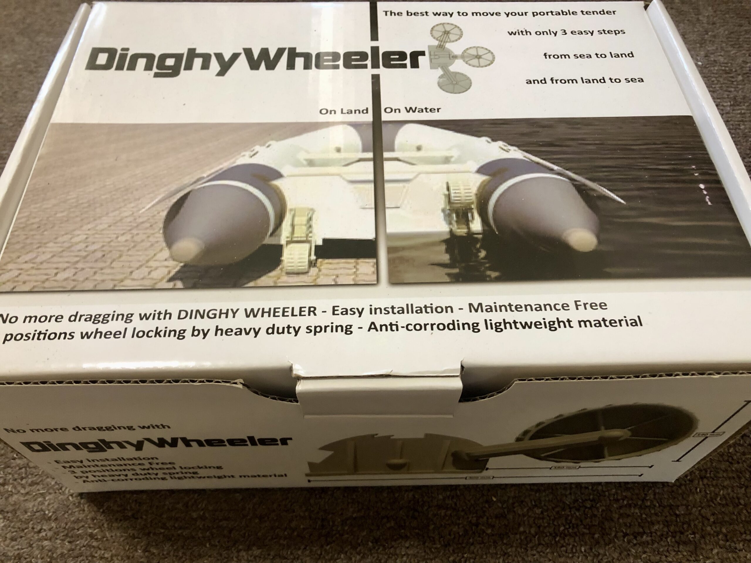 Retractable dinghy launching wheels