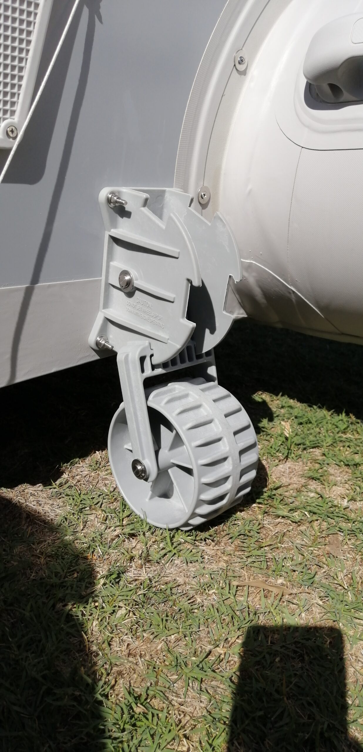 Retractable boat launching wheels for dinghy, inflatable boat, yacht tender, or zodiac